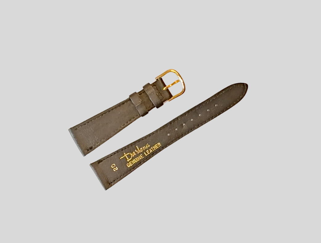 Brown leather watch strap with gold buckle on a light gray background