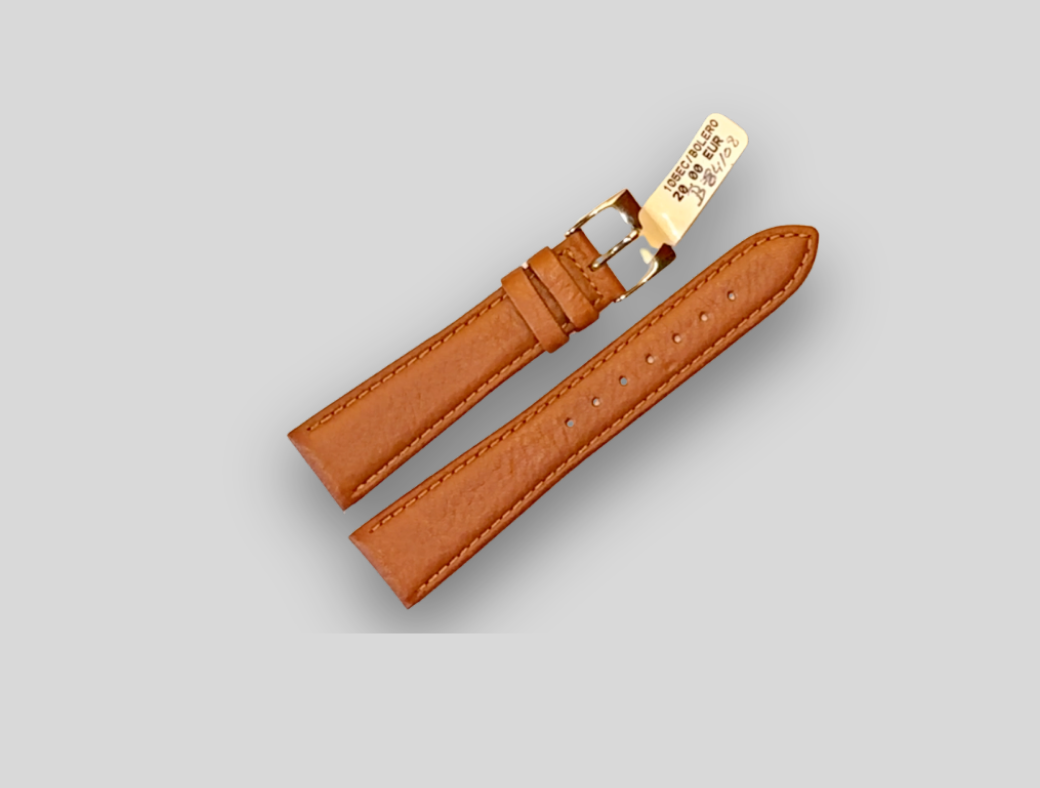 Brown leather watch strap with gold buckle on a light gray background