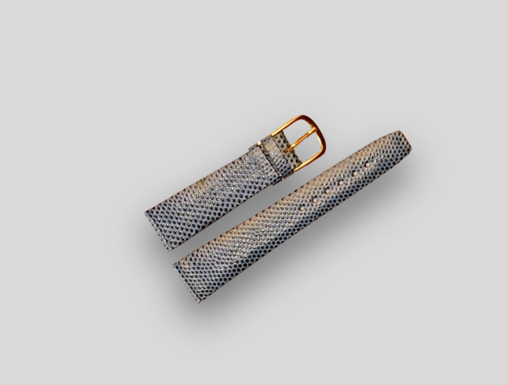 Woven watch strap with gold buckle on a light gray background