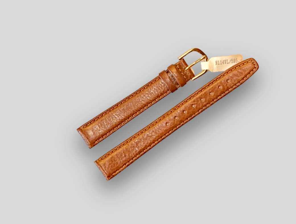 Brown leather watch strap with gold buckle on a light gray background