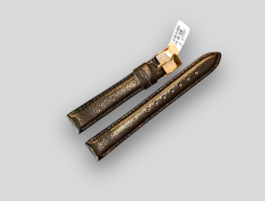 Brown leather watch strap with rose gold clasp on a light gray background