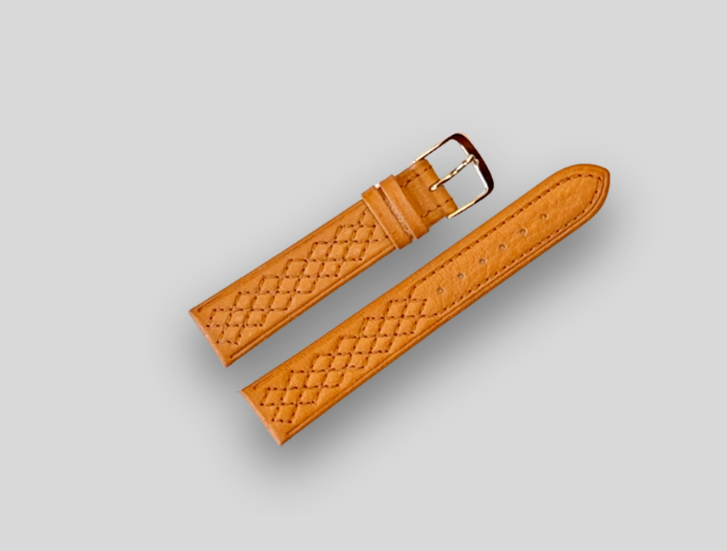 Brown woven watch strap with gold buckle on a light gray background
