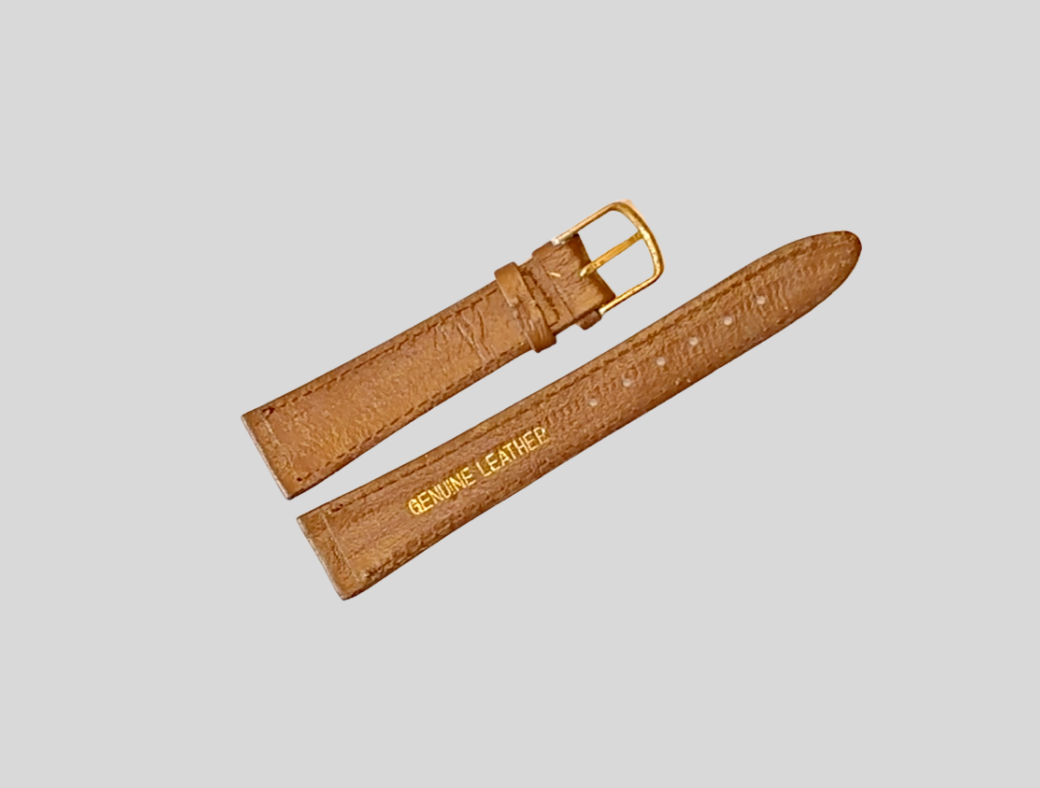 Brown leather watch strap with gold buckle on a light gray background